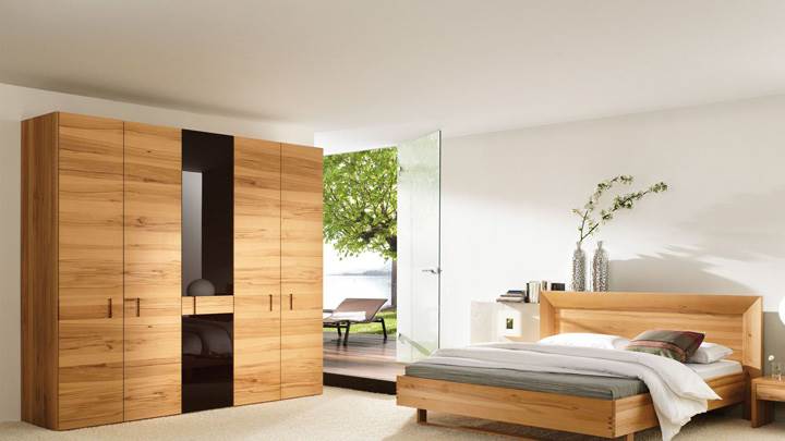 Wooden Furniture And Bed In Bedroom
